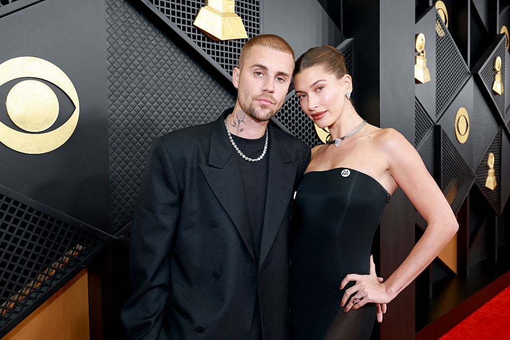 Two individuals airs connected a reddish carpet; 1 successful a relaxed suit, the different successful a strapless gown. Both deterioration jewelry