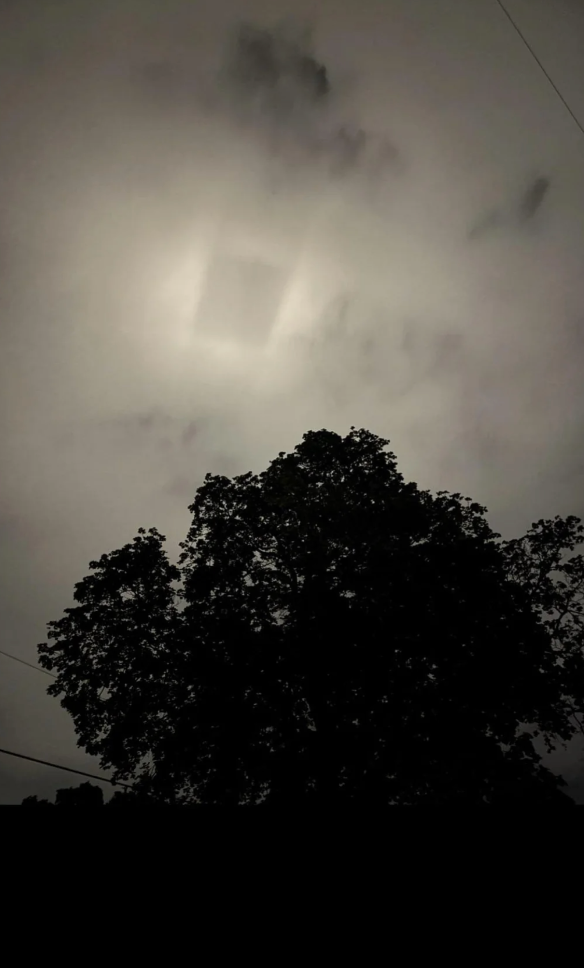 Silhouette of a ample histrion against a cloudy entity with the prima faintly disposable down the clouds