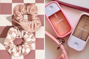 Two pink scrunchies on a checkered surface; next to them are two fragrance devices from Touchland laid on pink accessories