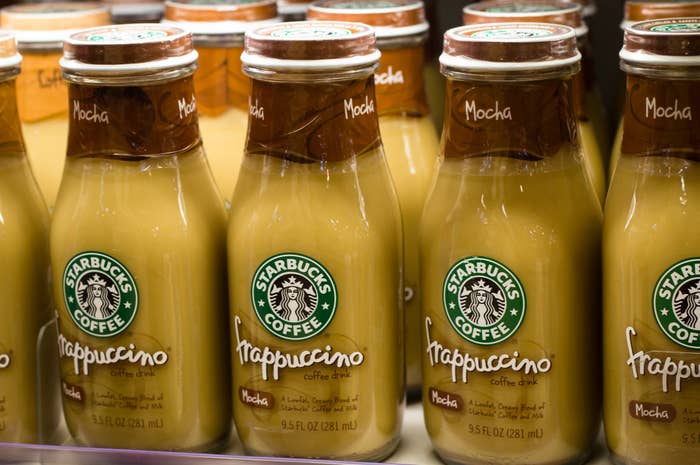Starbucks Mocha Frappuccino bottles displayed on a shelf. Bottles have Starbucks logo and "Frappuccino Coffee Drink" label