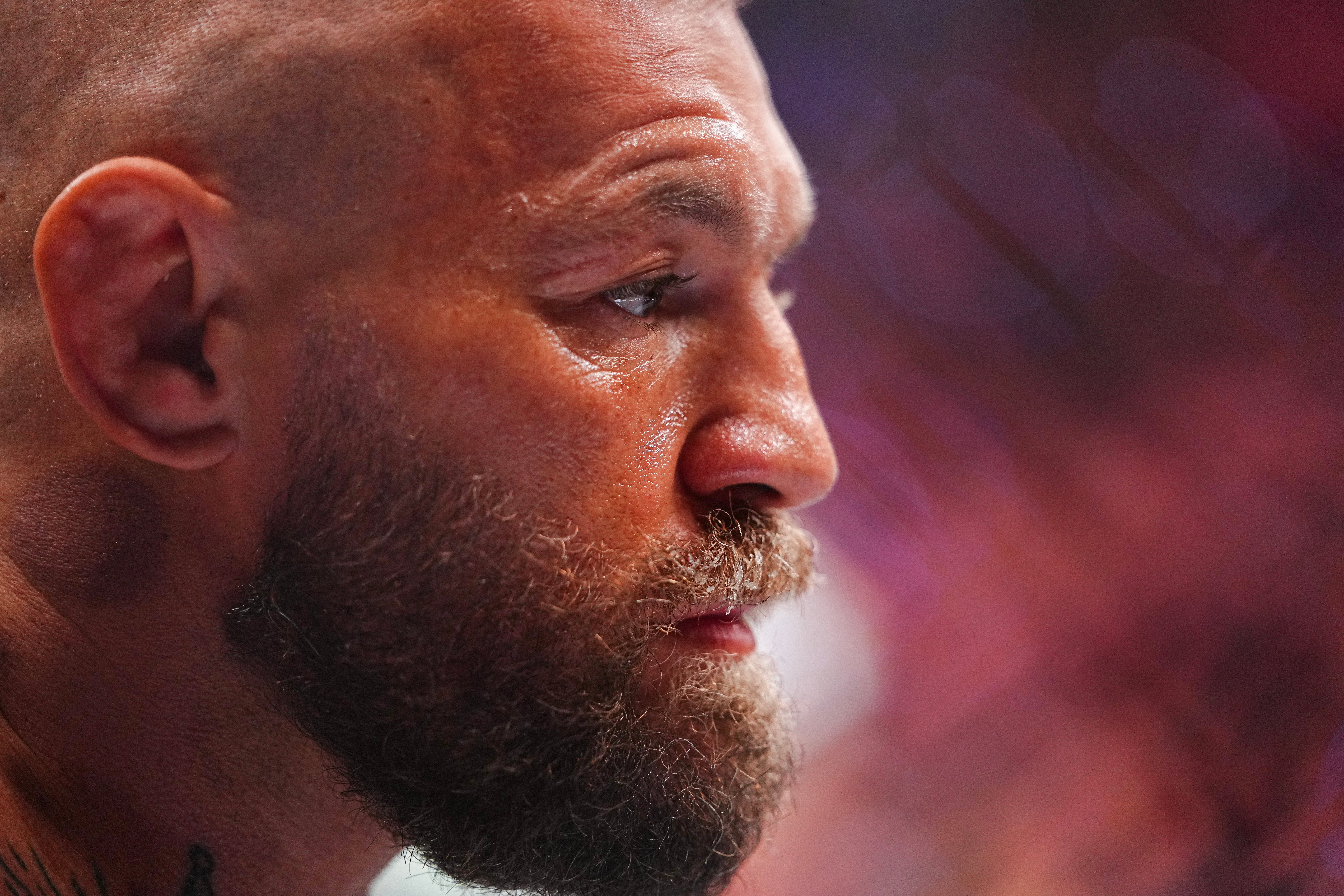 Conor McGregor of a person with a beard and buzz cut, seemingly in a focused or intense moment