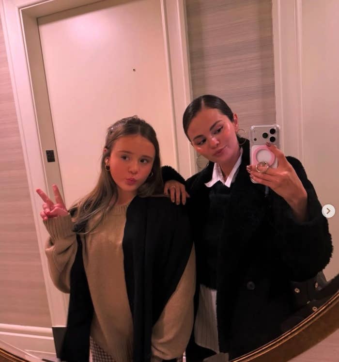 Gracie and Selena taking a selfie