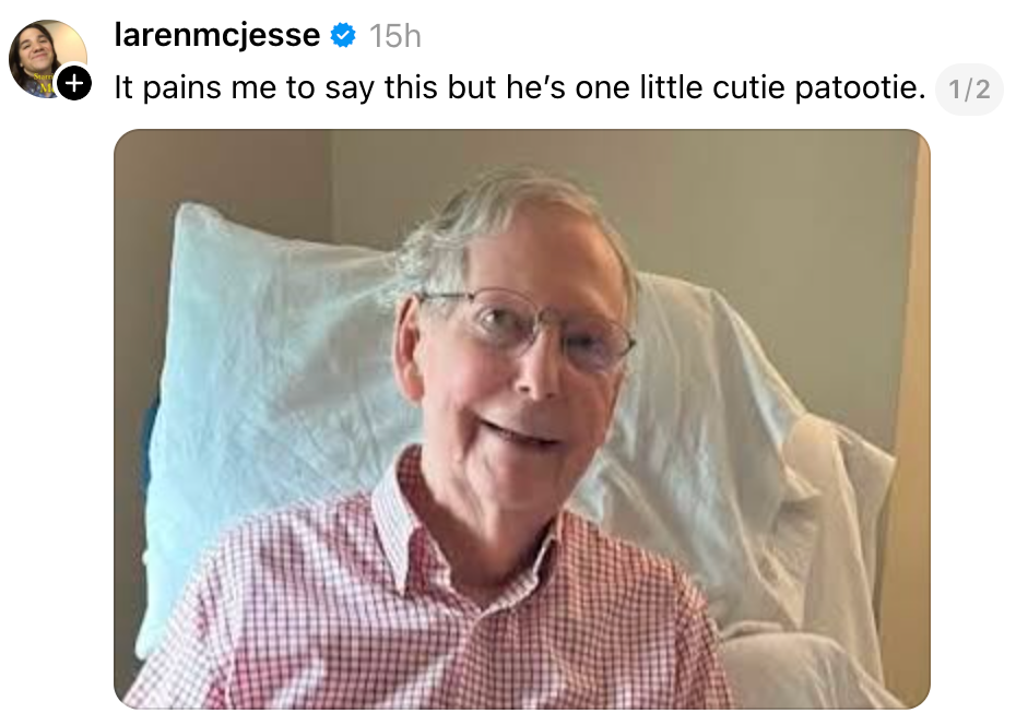 A person in a checkered shirt smiles while seated. A caption above reads: "It pains me to say this but he’s one little cutie patootie."