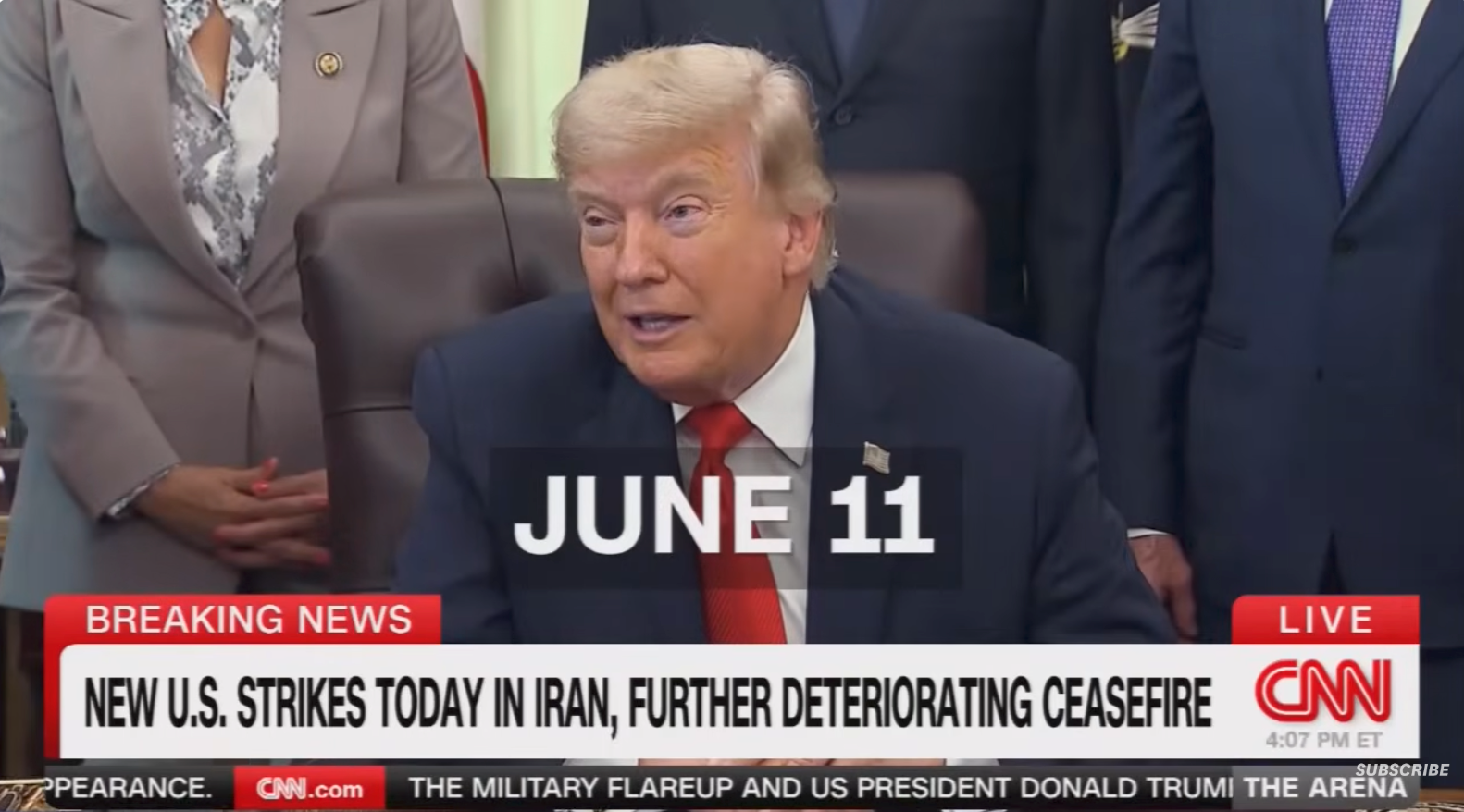 Donald Trump speaking at a desk with officials, CNN broadcast text reads "NEW U.S. STRIKES TODAY IN IRAN, FURTHER DETERIORATING CEASEFIRE."