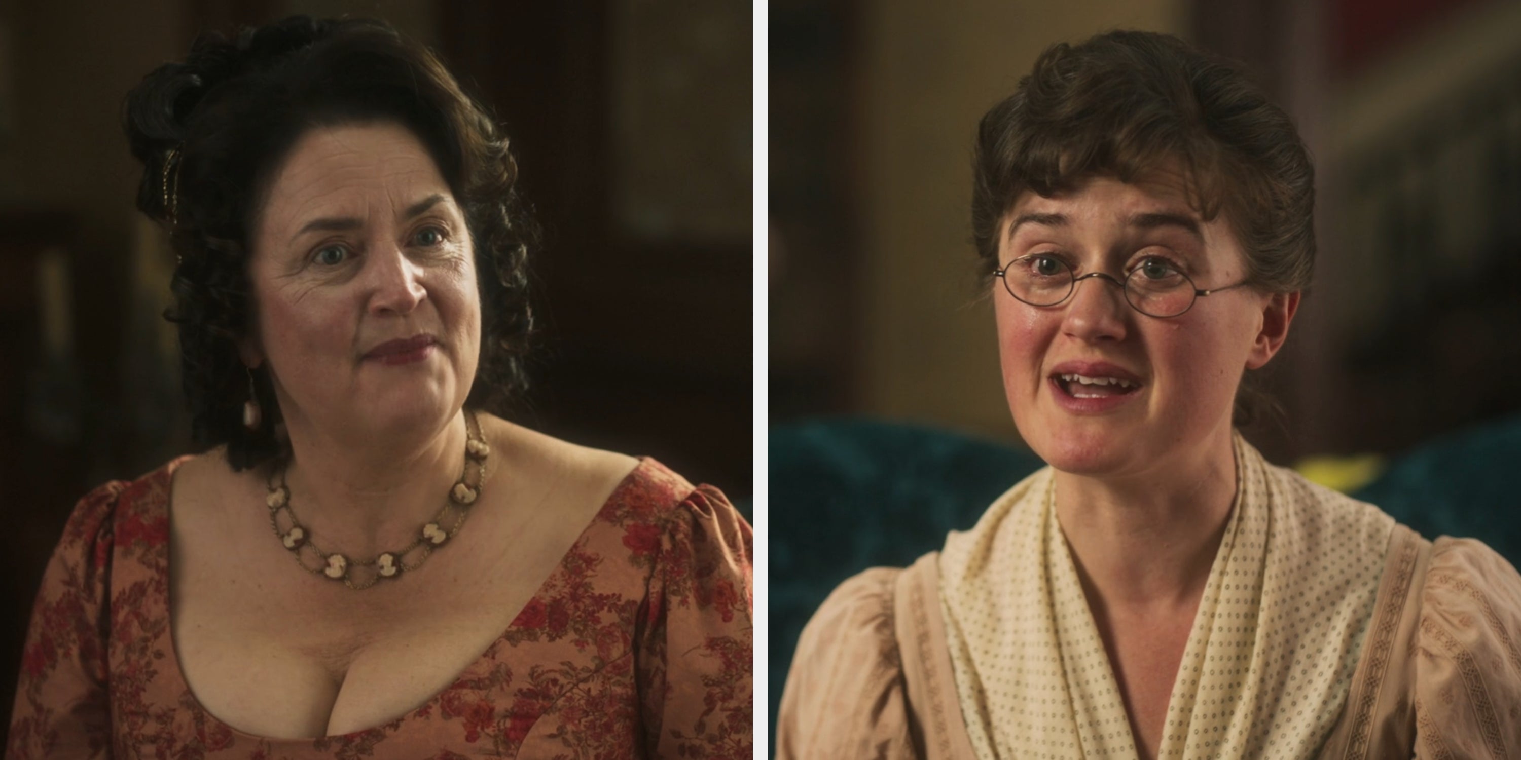 A woman wearing glasses and a vintage dress is sitting and speaking, her expression focused. Another person is blurred in the foreground