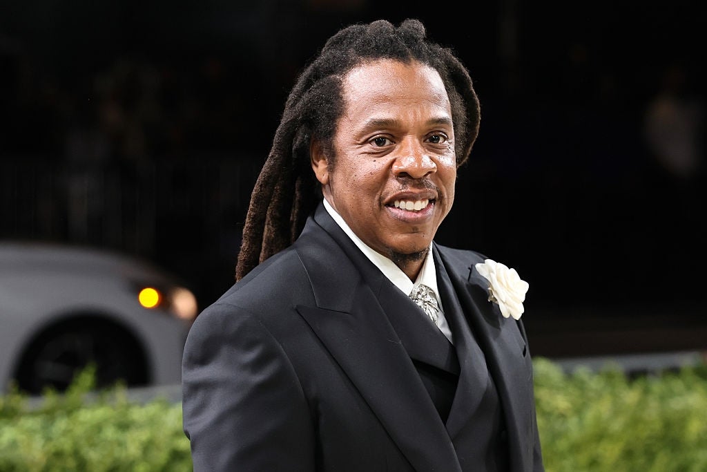 Jay Z wearing a suit at a red carpet event