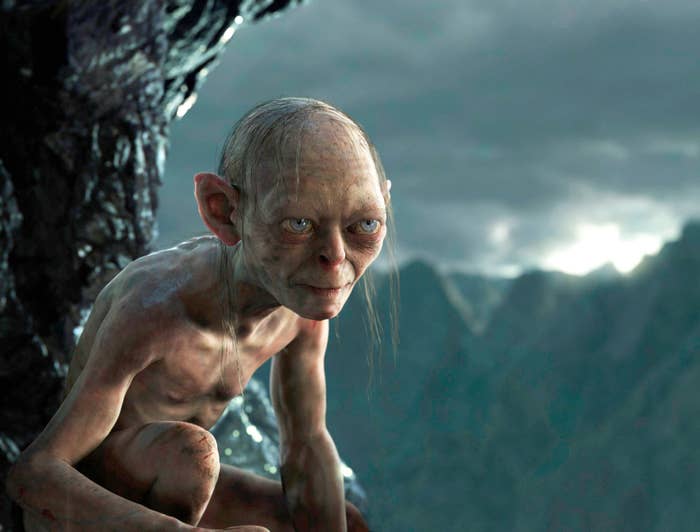 A CGI depiction of Gollum, a character from "The Lord of the Rings," in a mountainous landscape