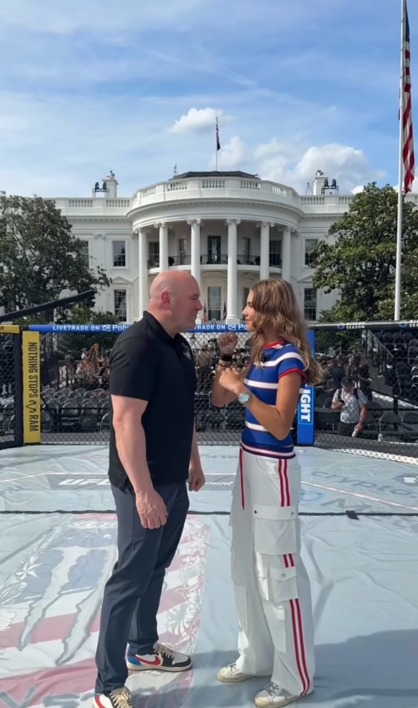 Two radical look disconnected successful a UFC octagon with the White House successful the background. One wears sporty, casual clothes; the different wears a polo and pants