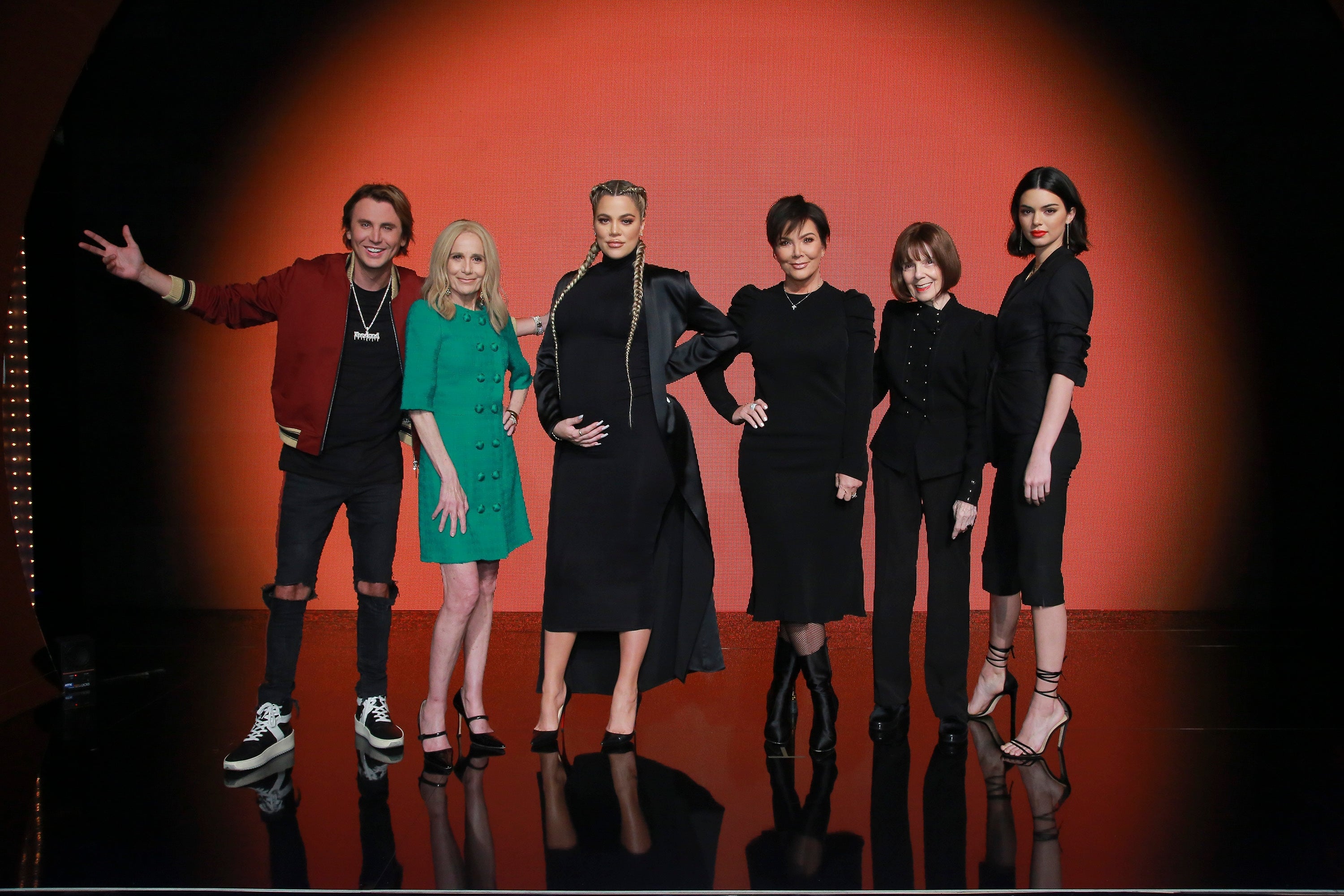 Kris Jenner standing next to her mom MJ on set of Family Feud
