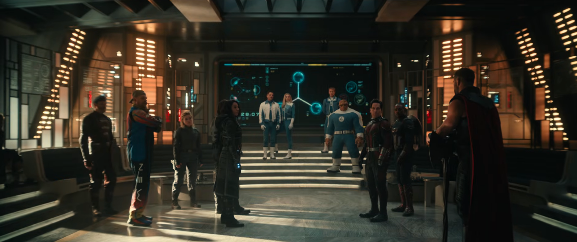 Group of characters in superhero attire stand in a futuristic room, facing each other in a tense standoff