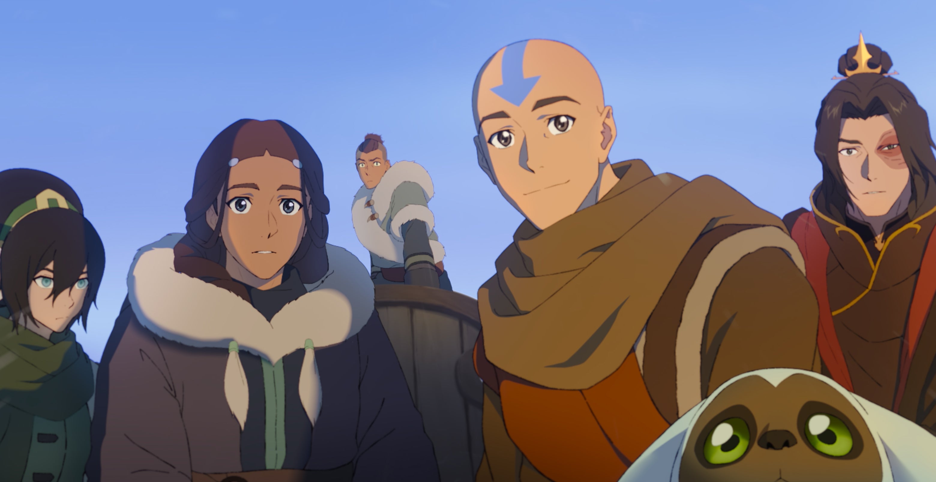 Animated characters from "Avatar: The Last Airbender" in winter gear, with unique hair styles and markings, standing together outdoors