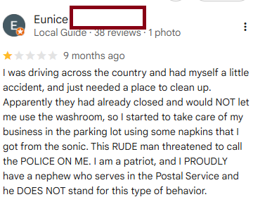 Review about being denied restroom access after an accident; mentions being threatened with police call, claims patriotism, and nephew's postal service