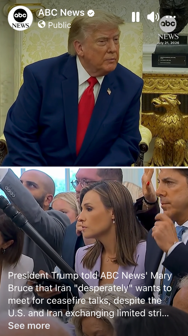 A antheral   successful  a suit   sits beside others successful  a gathering  room; journalists with microphones study  connected  the event