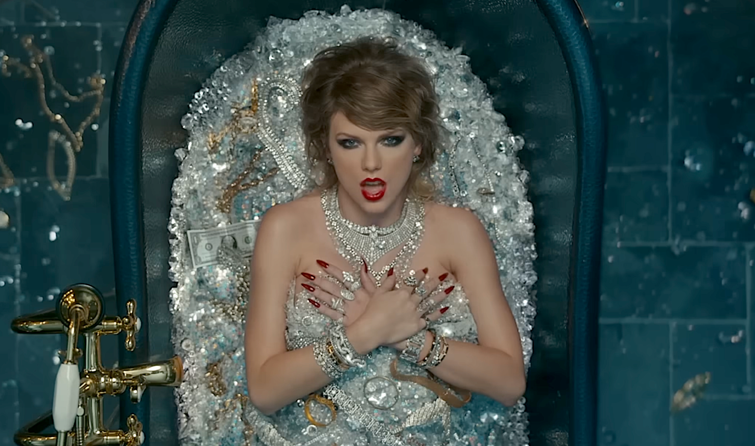 Taylor Swift in the Look What You Made Me Do music video in a bathtub full of diamonds