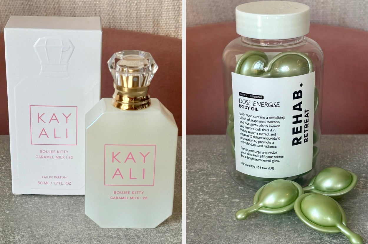 Two beauty products on a counter: Kayali perfume in a bottle with a box and Rehab body oil capsules in a clear jar