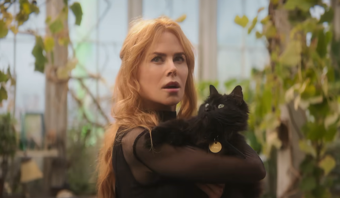 Nicole Kidman holding a black cat in "Practical Magic 2"