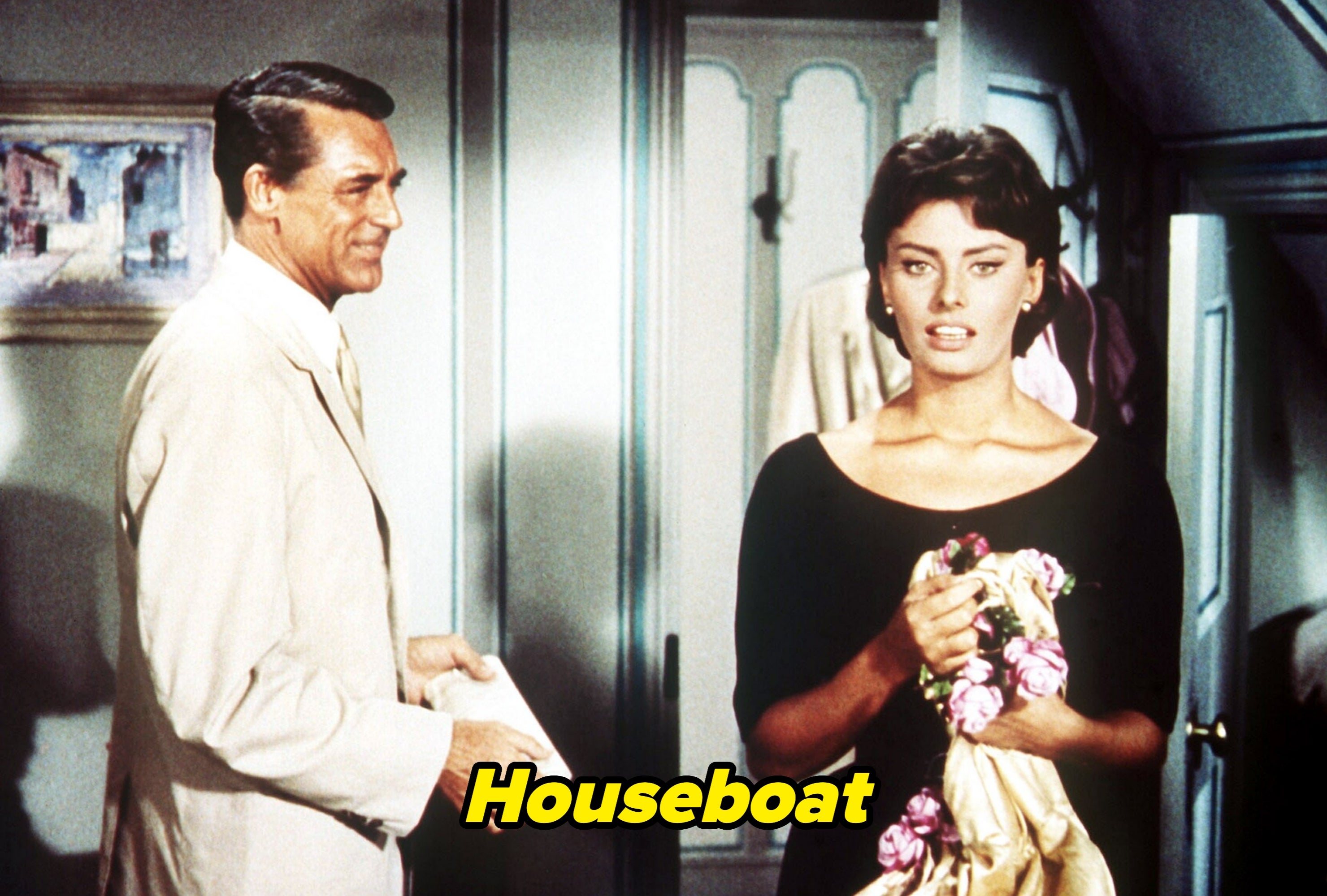 Cary and Sophia in "Houseboat"