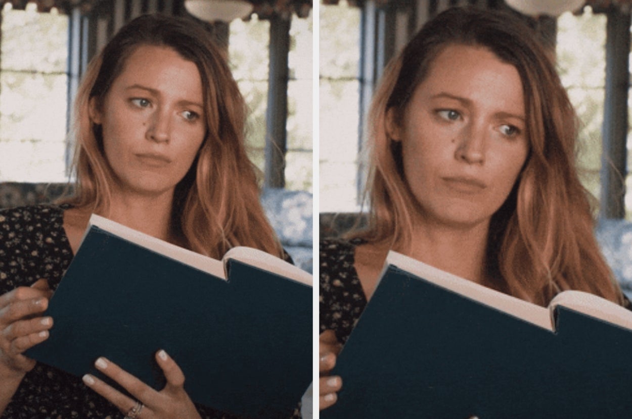 Person reading a book indoors, looking thoughtful, casual attire