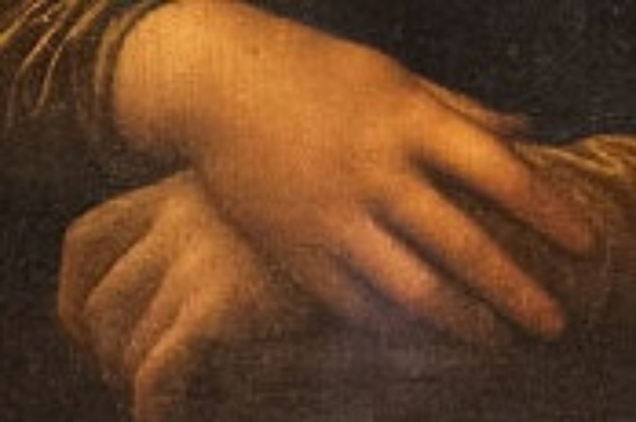 Close-up of two hands gently resting on each other, suggesting a serene or contemplative mood