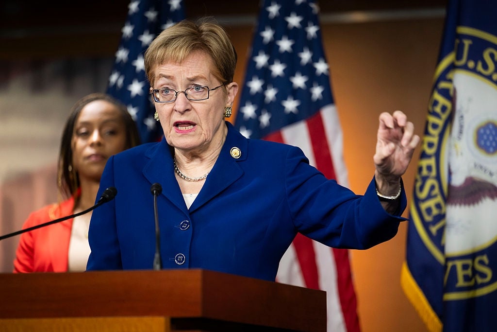 Marcy Kaptur at a podium speaking during a press conference