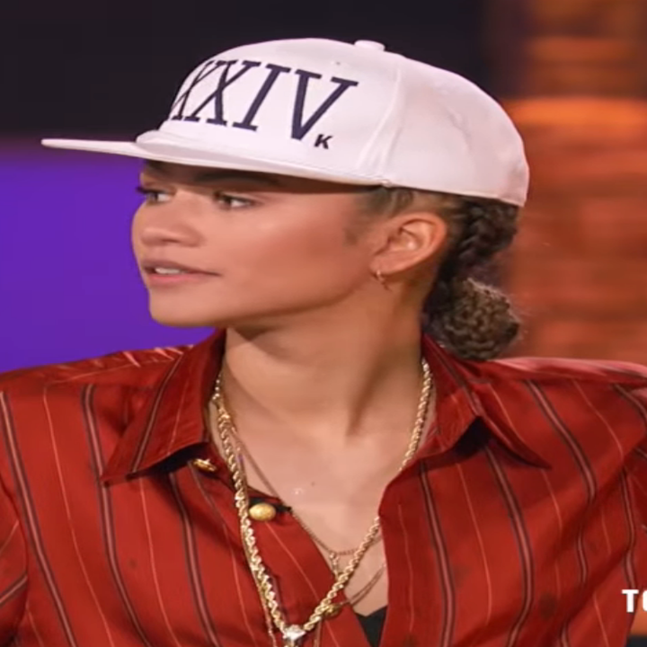 Person in a red pinstripe shirt and white cap on a TV show set. Text: New Lip Sync Battle tonight 7:30/6:30c on MTV