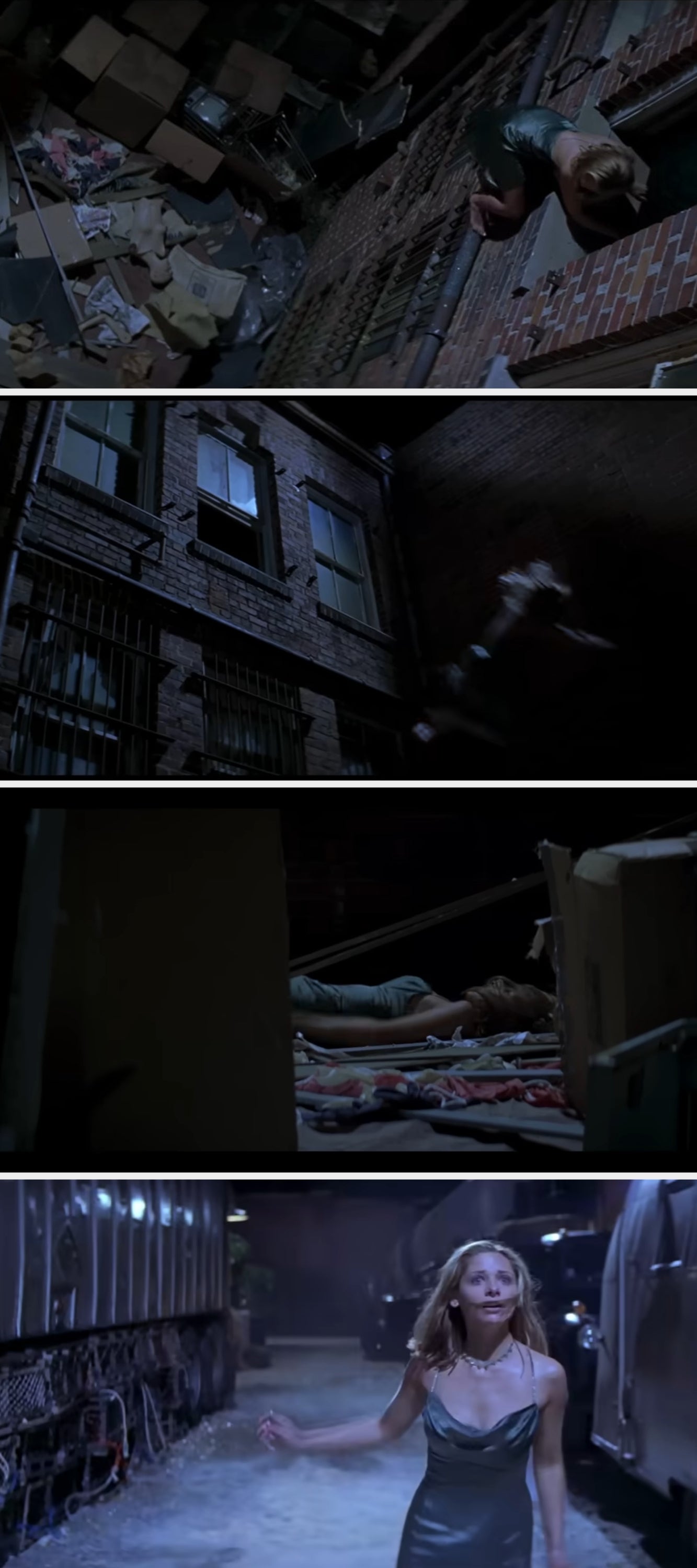 A person climbs a brick wall into a window amidst scattered debris and boxes in a dark alleyway