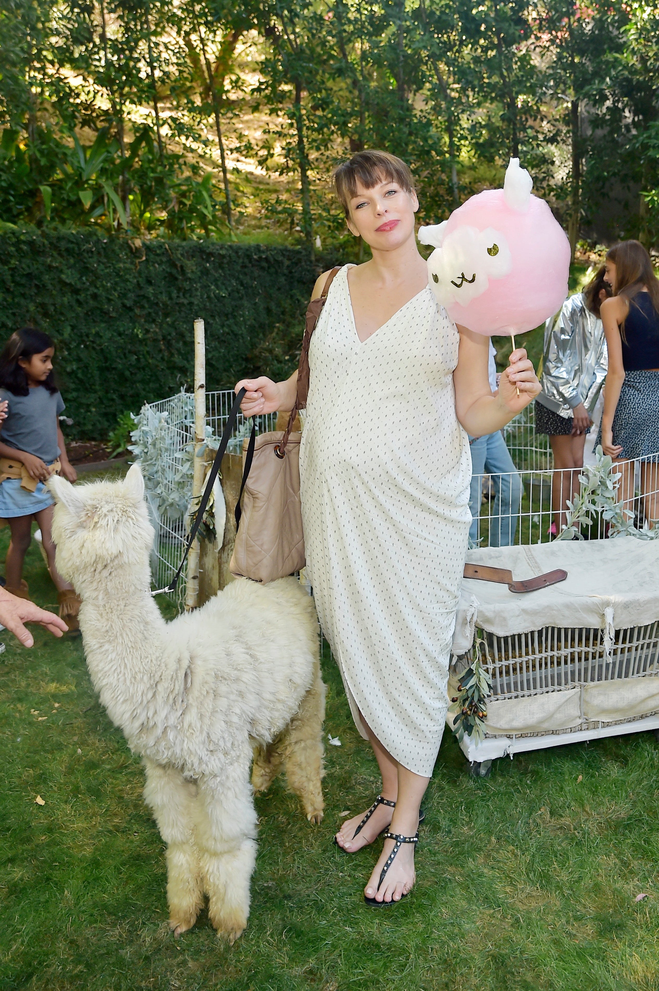 Milla Jovovich at an outdoor event