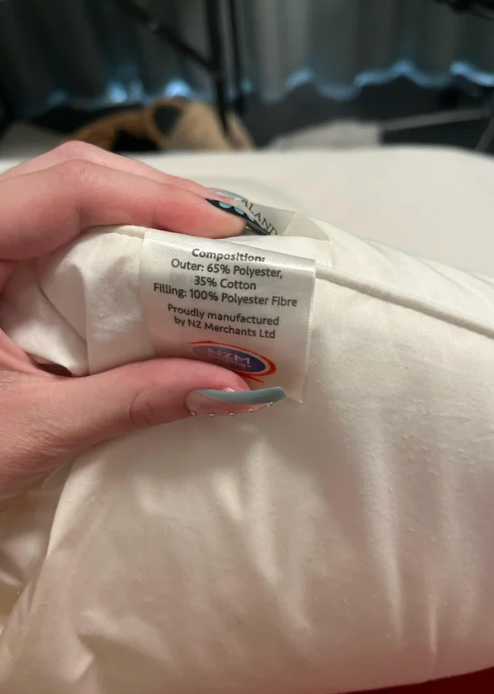  65% polyester, 35% cotton; filling is 100% polyester fiber. Manufactured by NZ Merchants Ltd