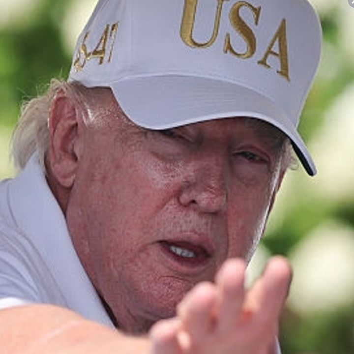 Person in a white cap with "USA" text, wearing a polo shirt, arm extended forward