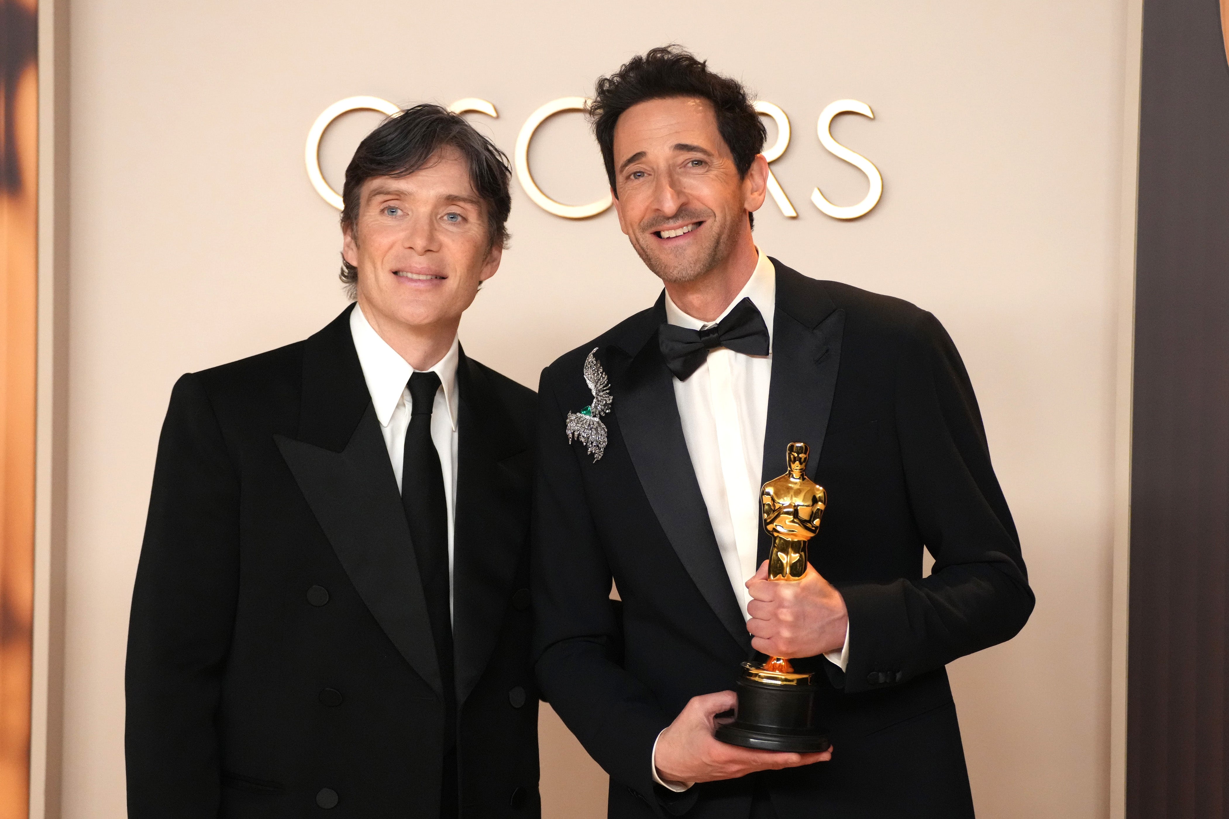 Cillian Murphy and Adrian Brody posing together at the Oscars