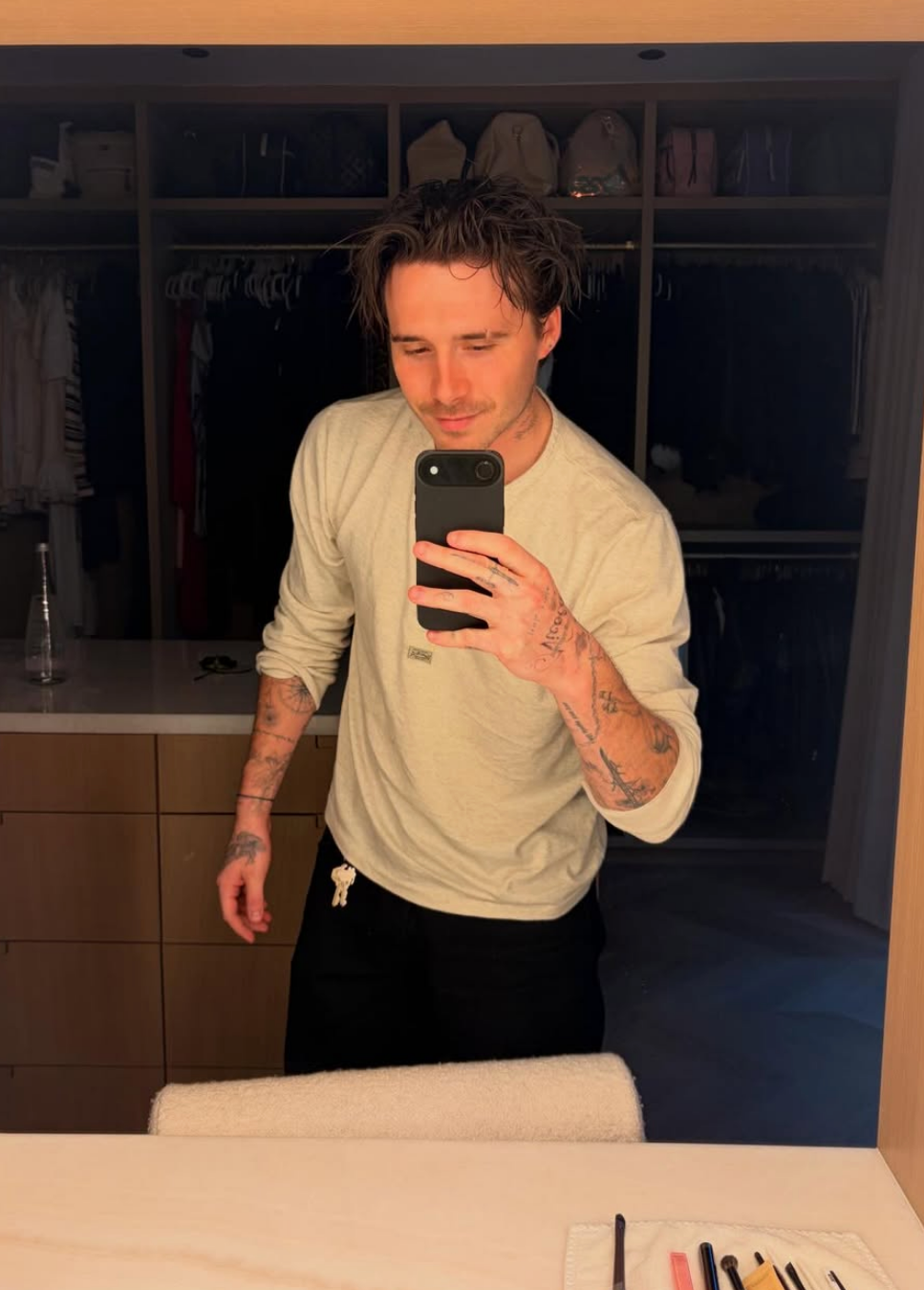 Brooklyn taking a mirror selfie