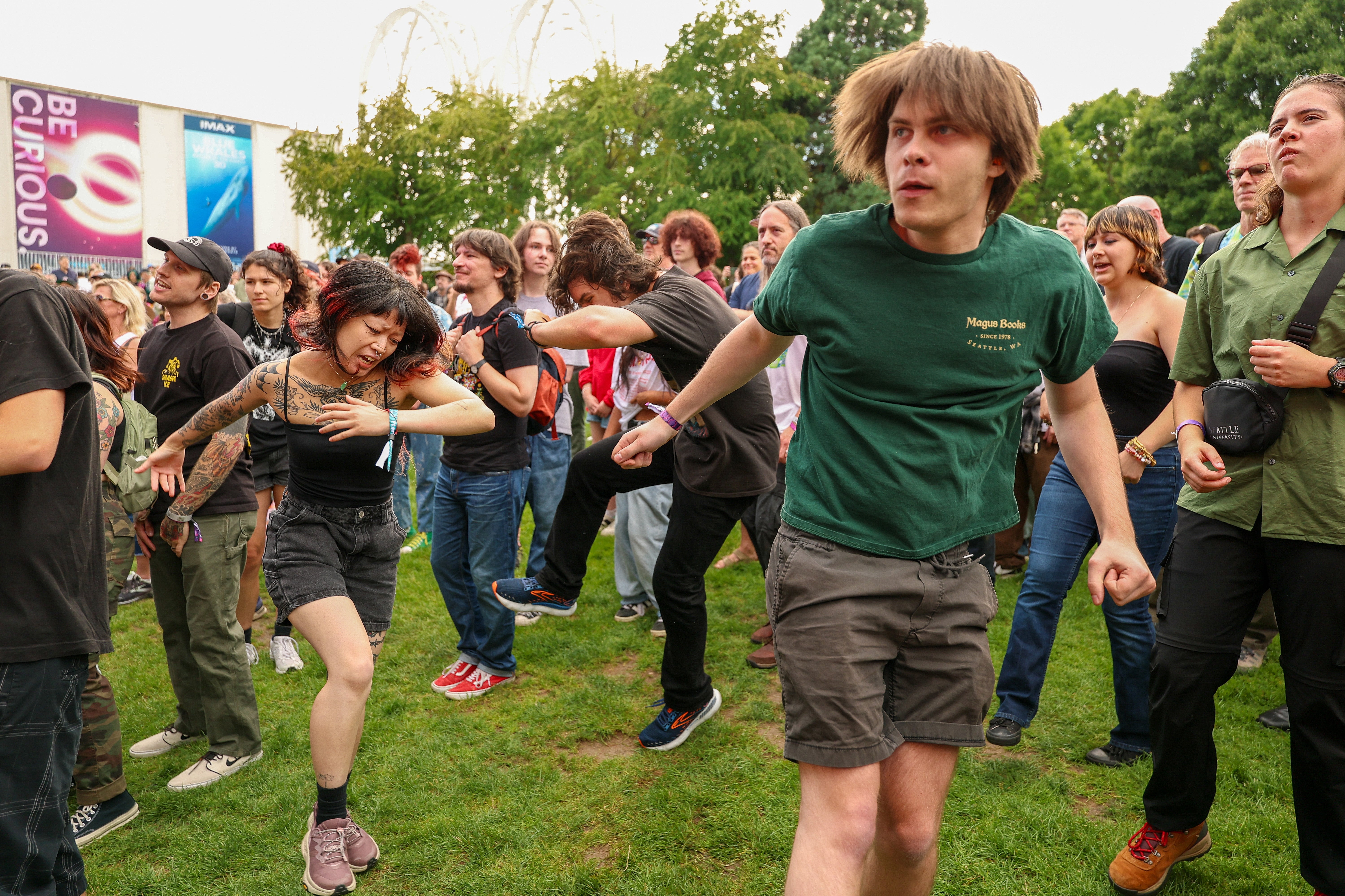 A group of people in a mosh pit