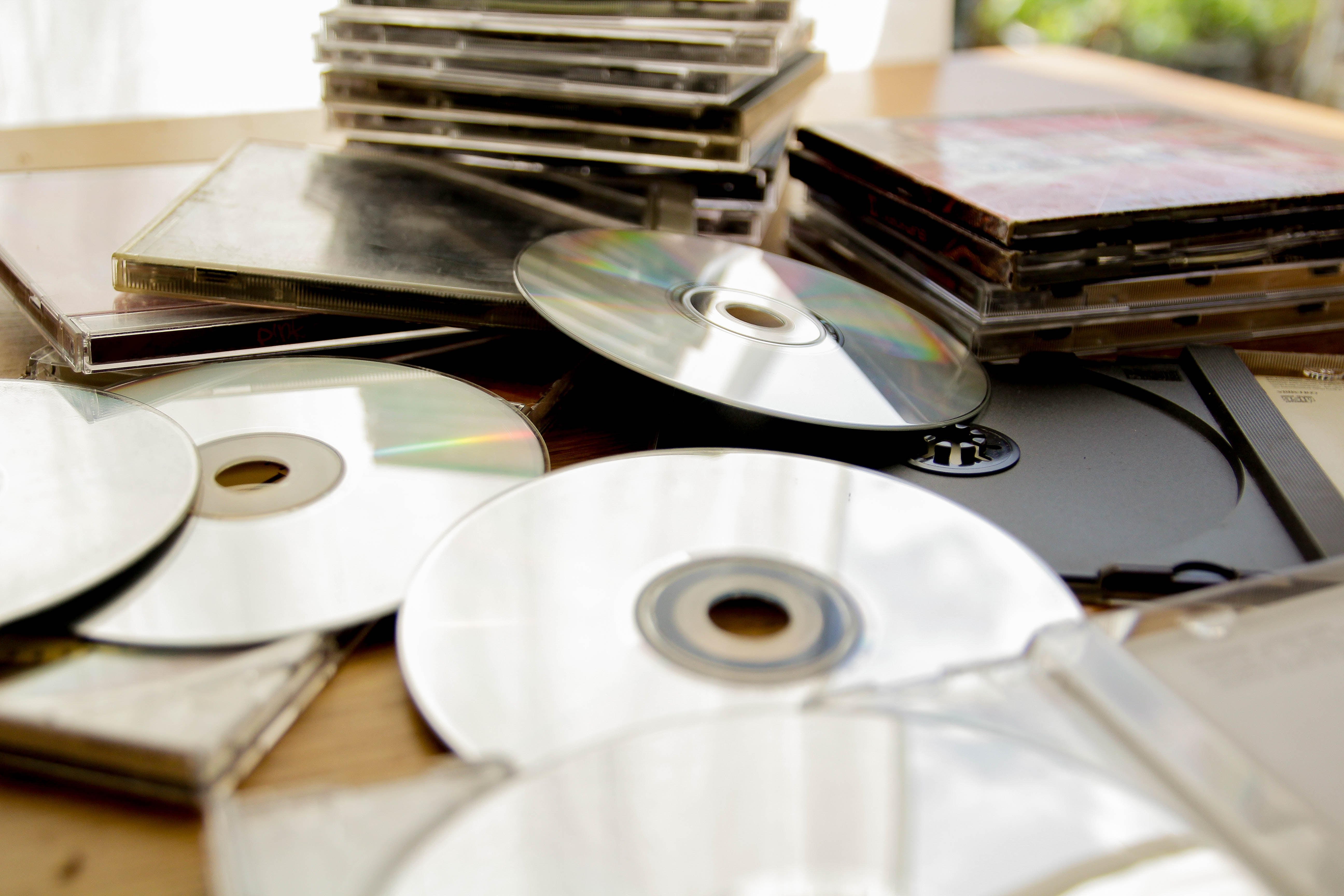 Scattered CDs and cases on the table