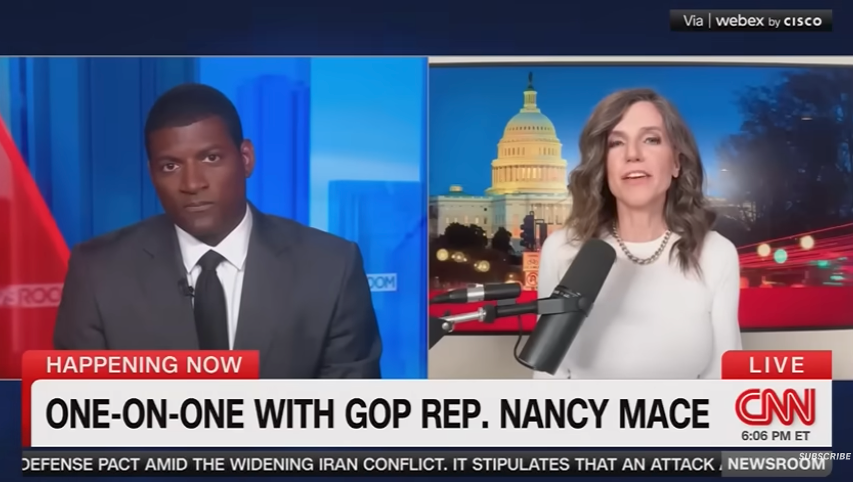 CNN-intervju med delt skjerm med nyhetsanker og rep. Nancy Mace som diskuterer aktuelle hendelser. US Capitol synlig i bakgrunnen