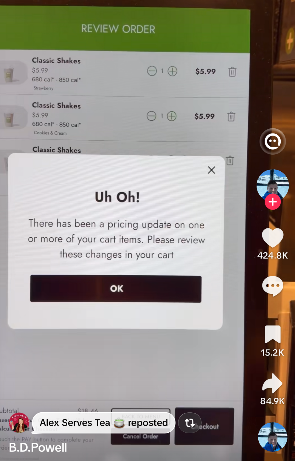 Digital screen showing a shopping cart with a pop-up message about a price update on selected items