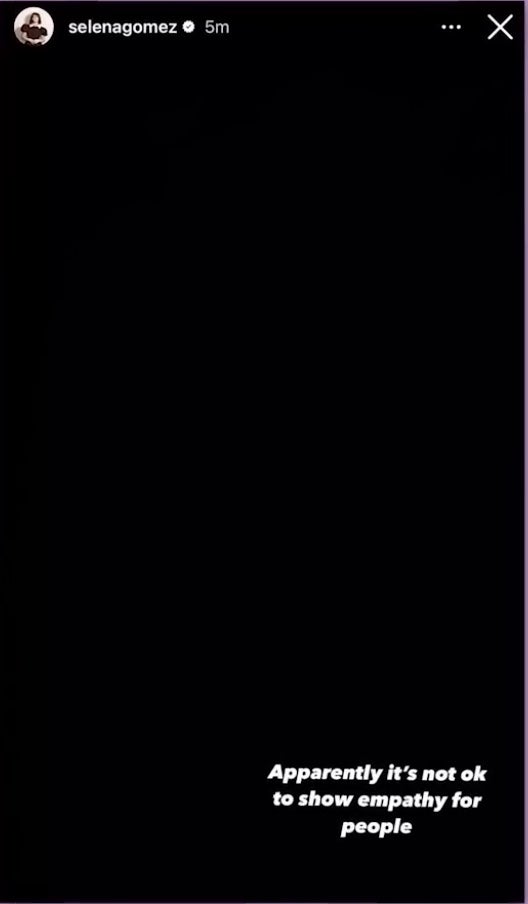 Instagram story by Selena Gomez, saying: "Apparently it's not ok to show empathy for people" in small white text.