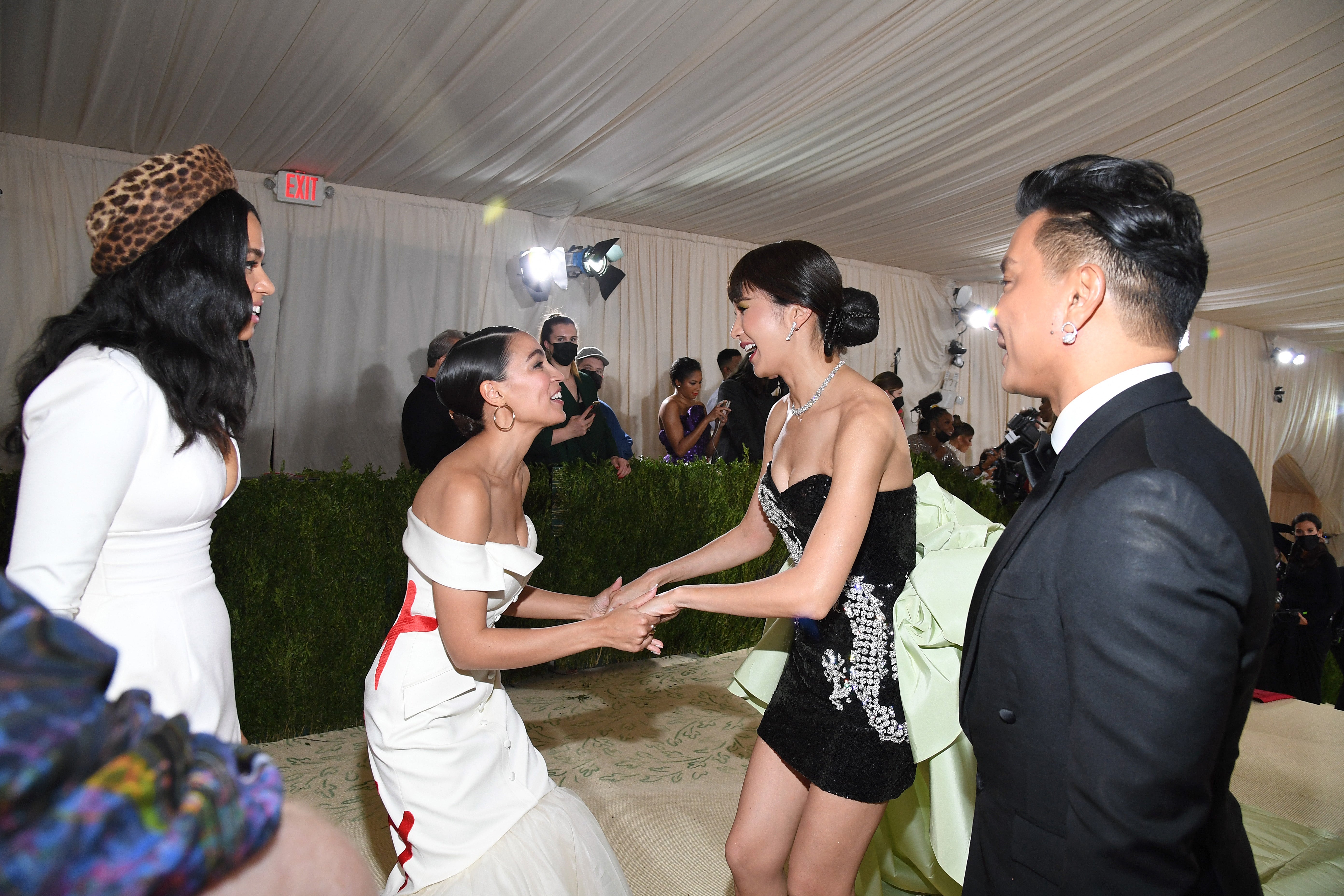 Alexandria Ocasio-Cortez and Gemma Chan enjoying a lively conversation at the Met Gala