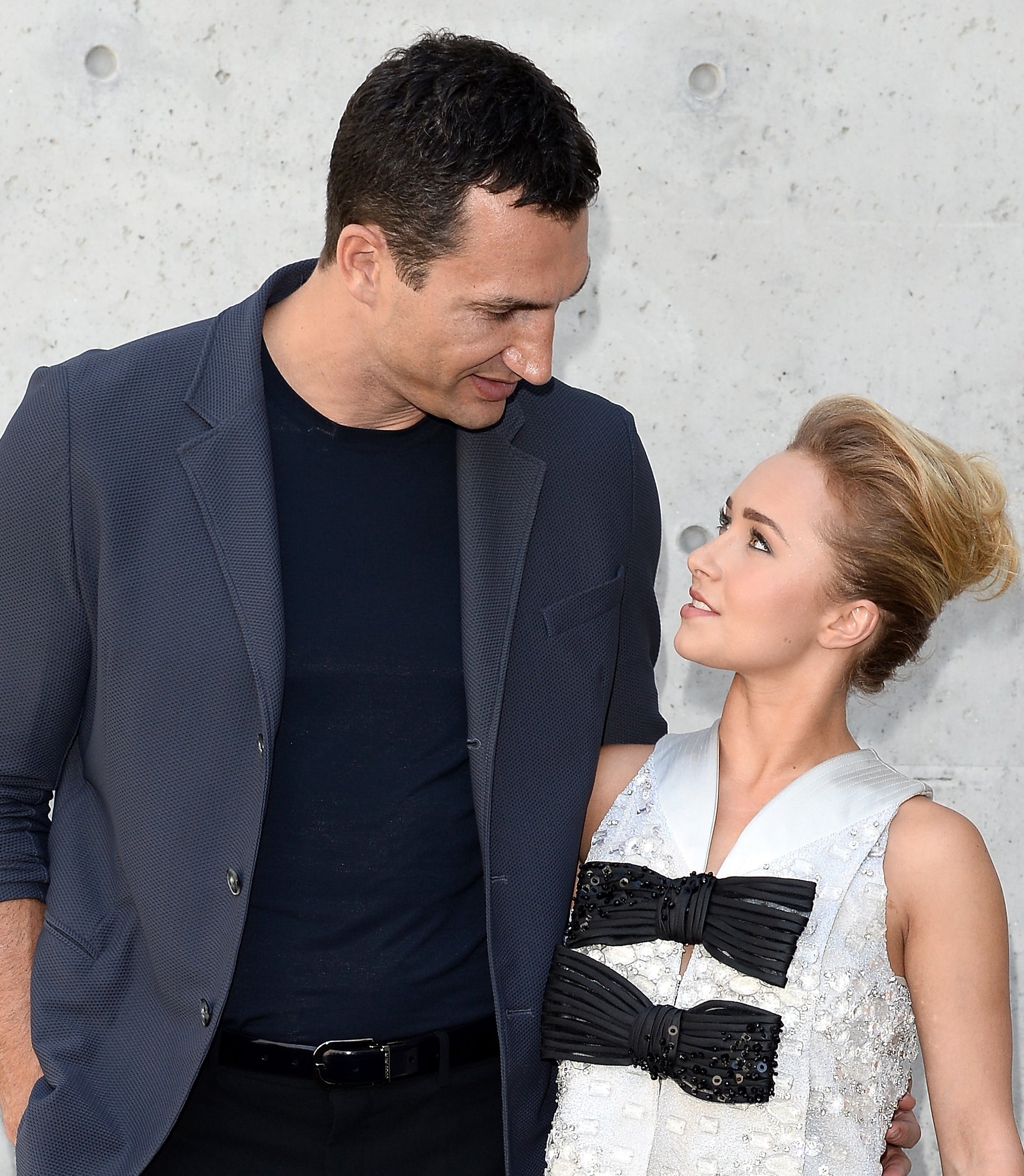 Wladimir Klitschko and Hayden smiling at each other at an event