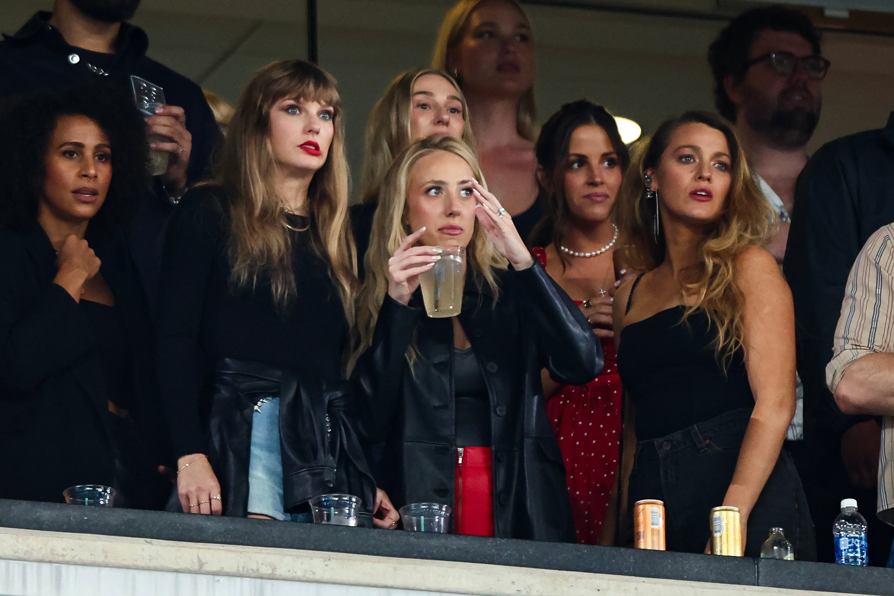 Taylor Swift, Brittany Mahomes, and Blake Lively watch from the stands during an NFL football game between the New York Jets and the Kansas City Chiefs at MetLife Stadium.
