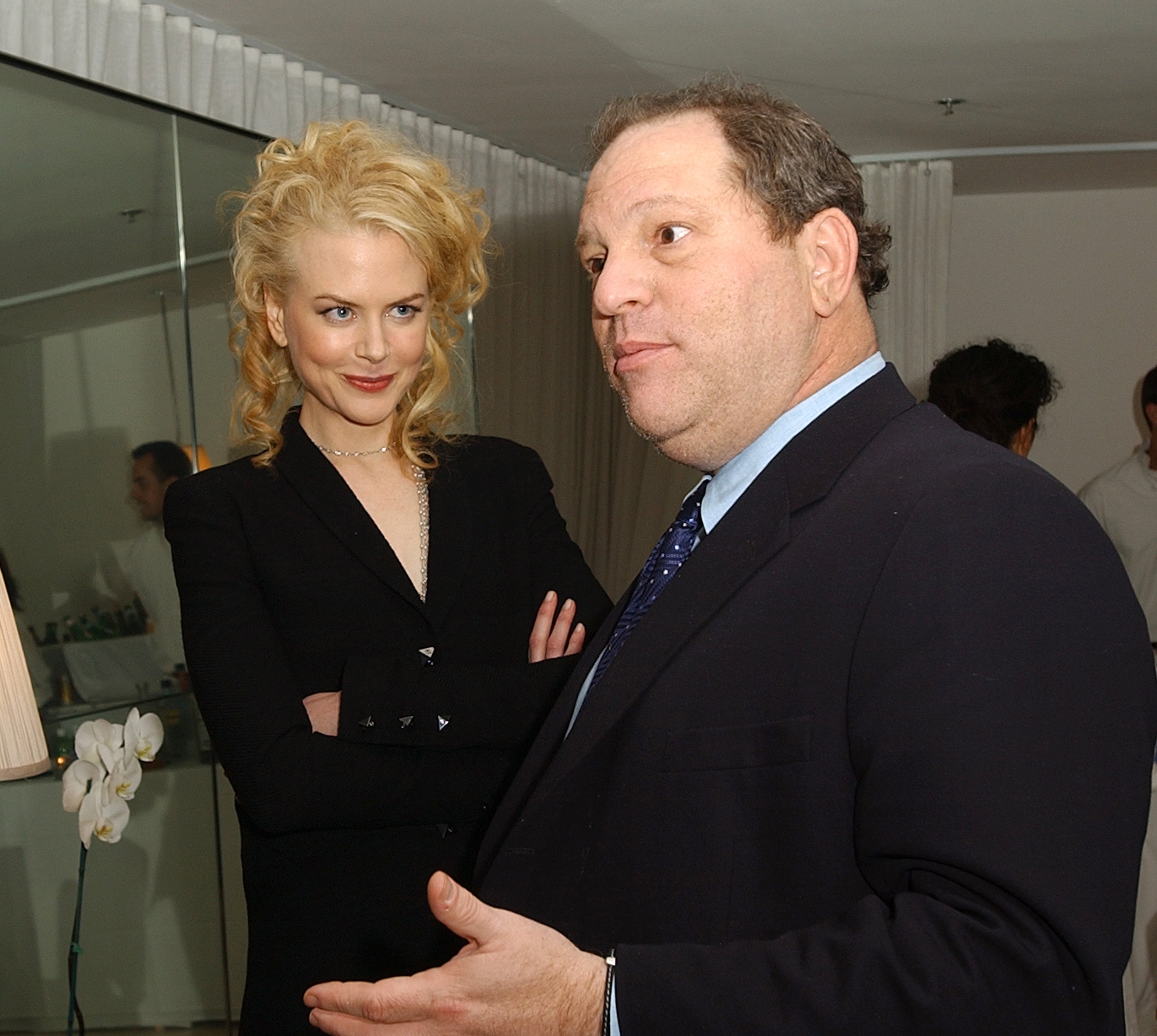 Nicole Kidman stands beside Harvey Weinstein at the Cold Mountain Pre-Golden Globe dinner