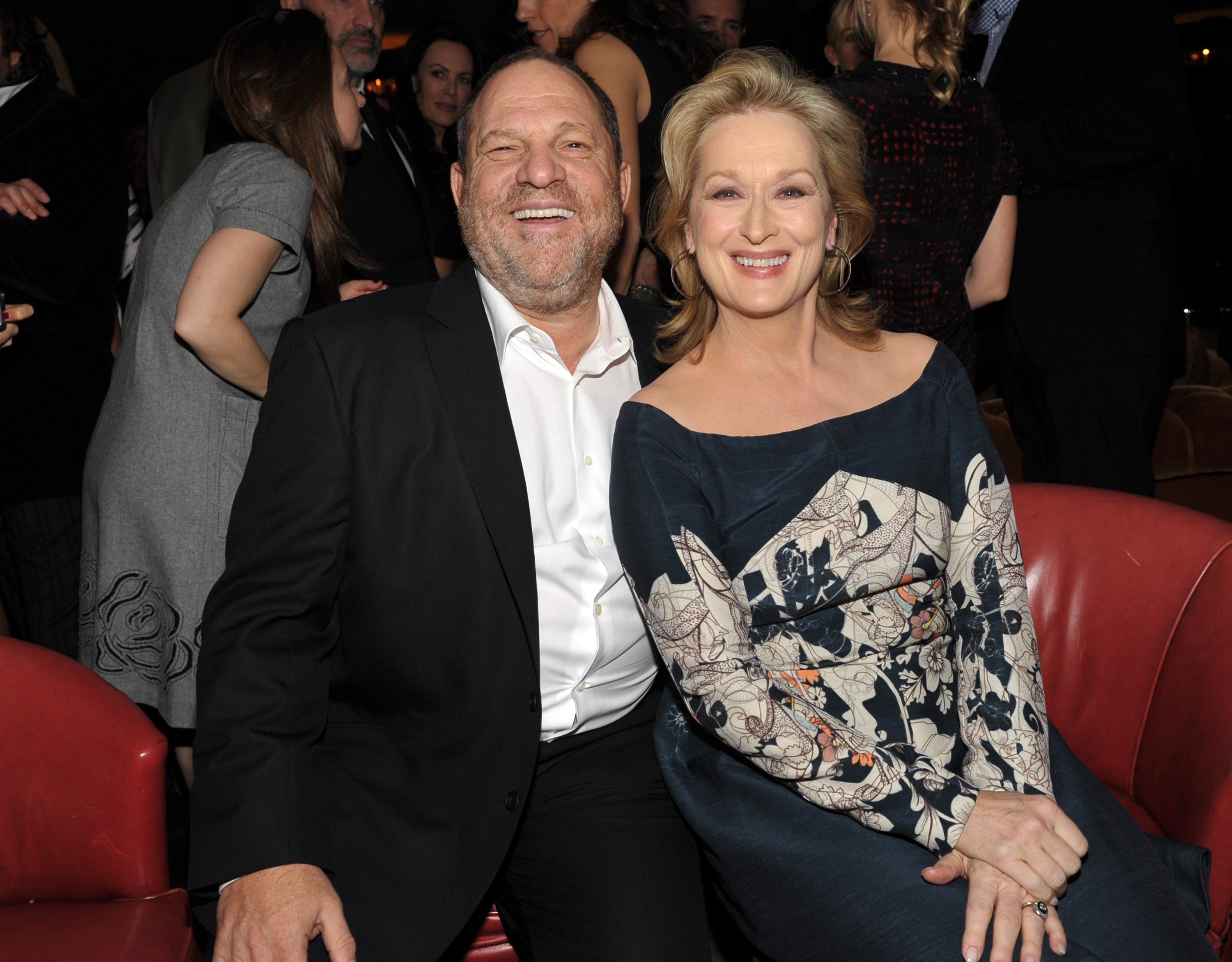 Harvey Weinstein and actress Meryl Streep happily sit next to one another at the Australian Academy Of Cinema And Television Arts International Awards Ceremony