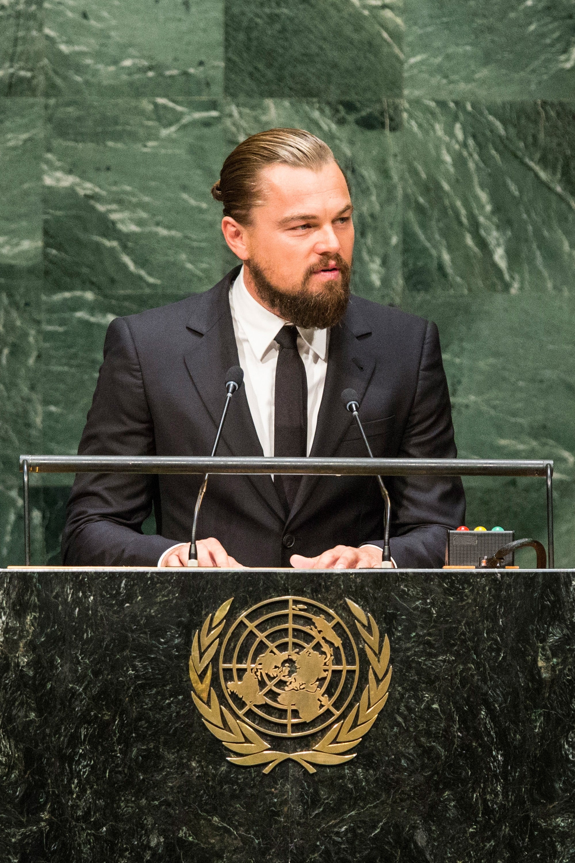 Leonardo DiCaprio speaks on a podium at the United Nations Climate Summit