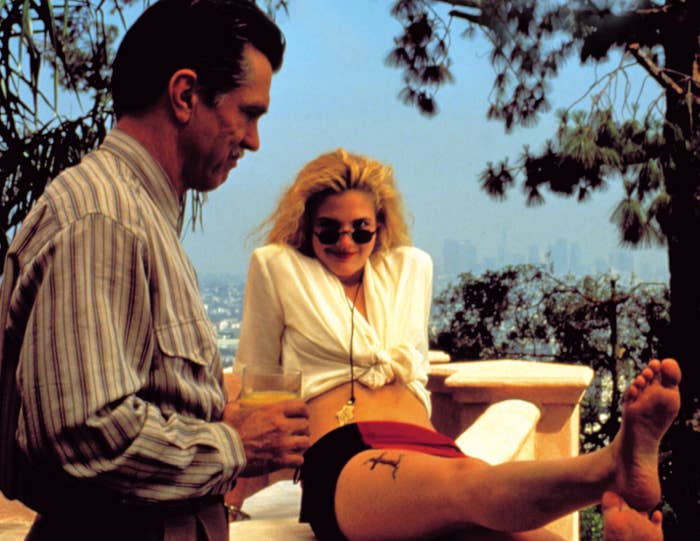 Tom Skerritt and Drew Barrymore in a movie scene