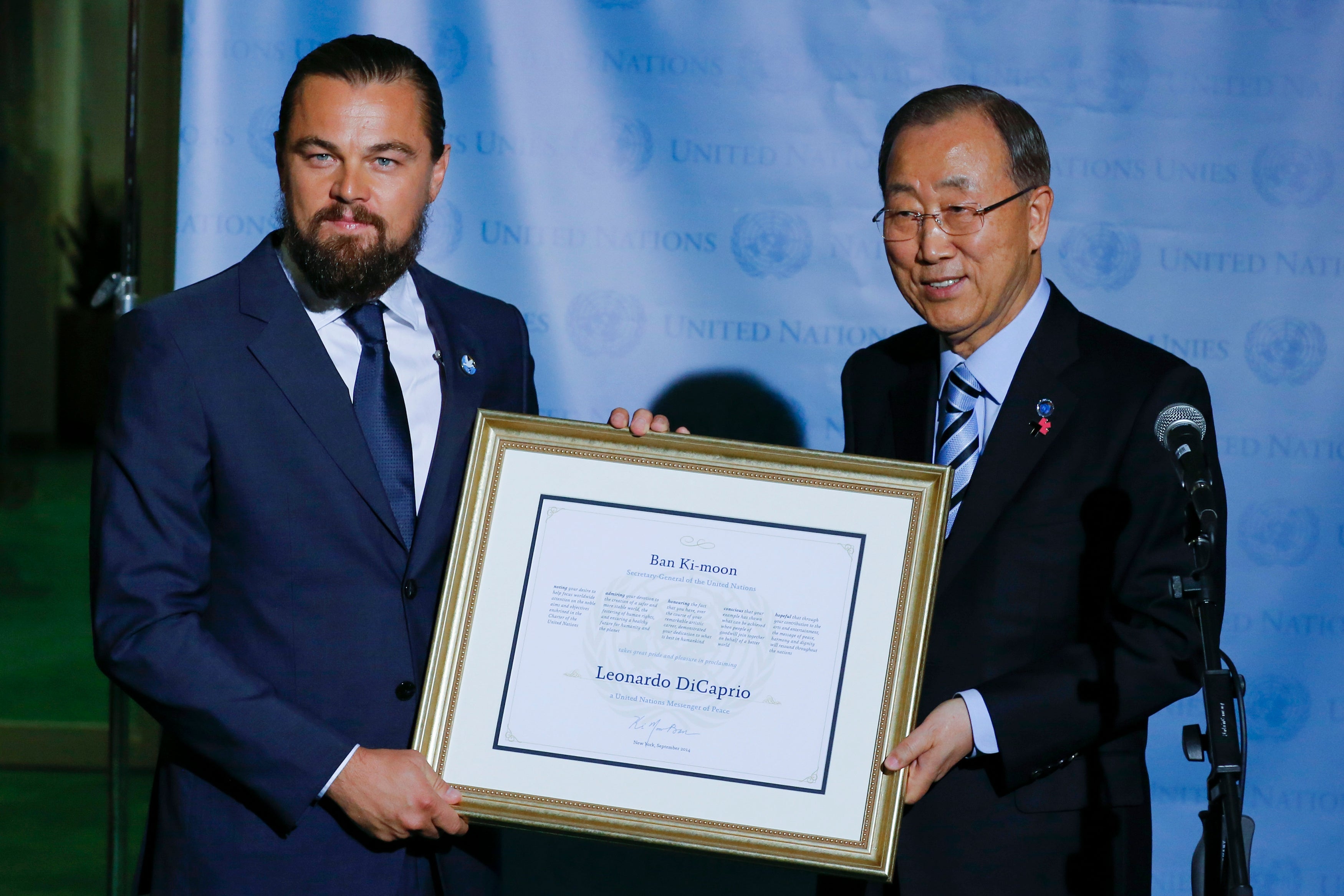 Leonardo DiCaprio receives a UN Messenger of Peace designation from United Nations Secretary General Ban Ki-moon