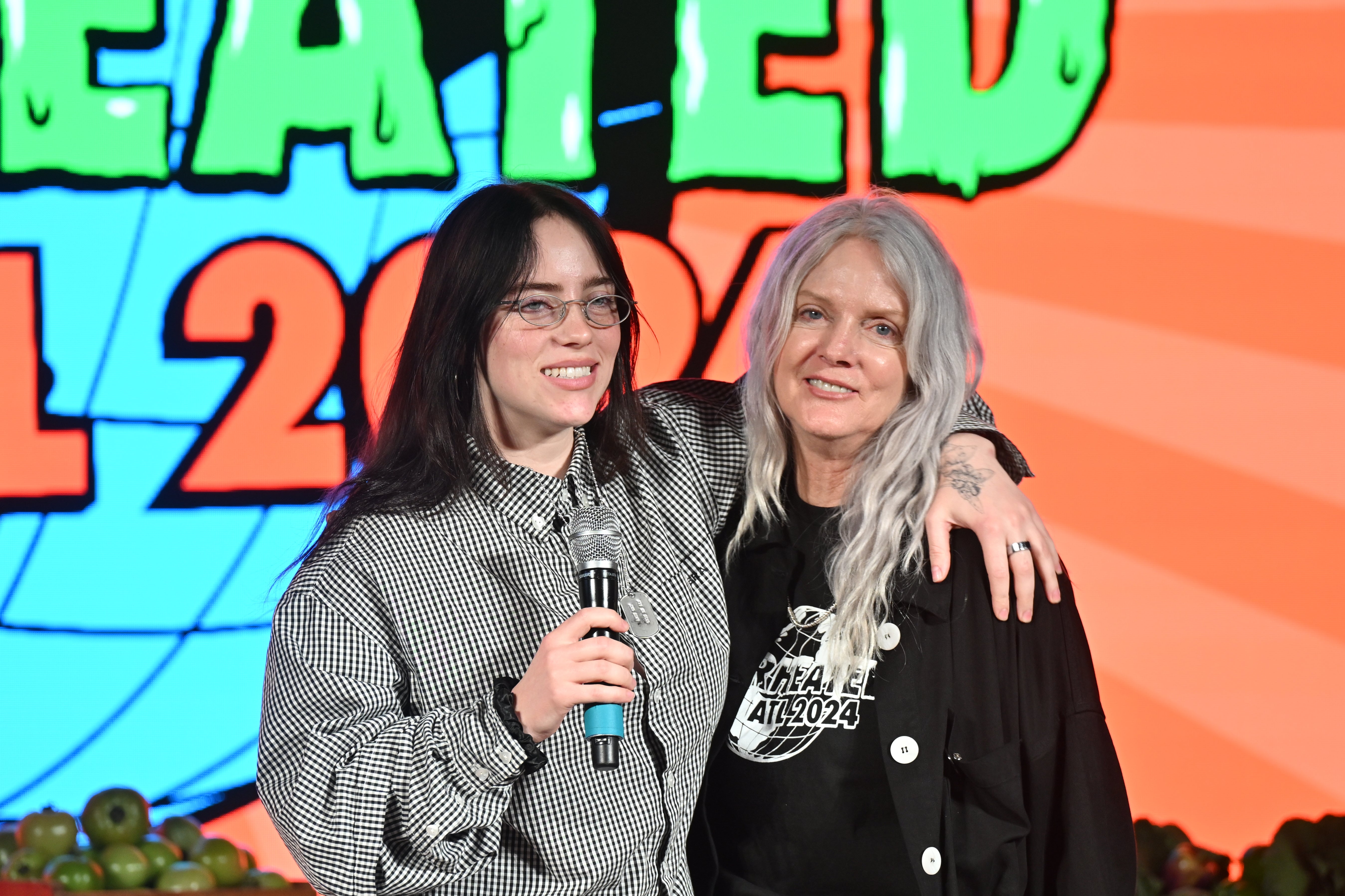 Billie Eilish and Maggie Baird onstage during "Overheated" presented by Support + Feed