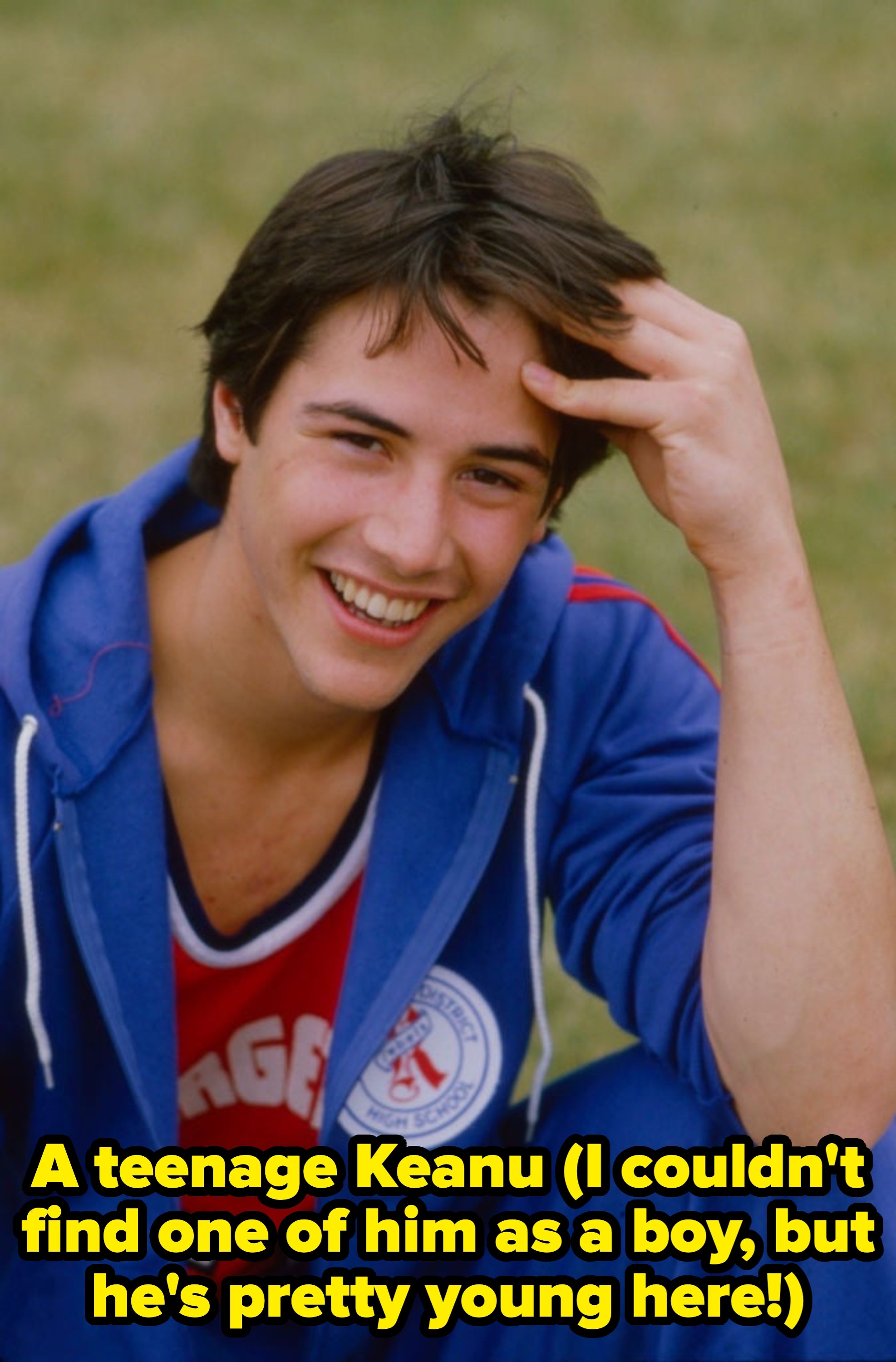 Person smiling and wearing a casual athletic outfit with a jacket over a shirt. The setting is outdoors, suggesting a relaxed or sporty environment