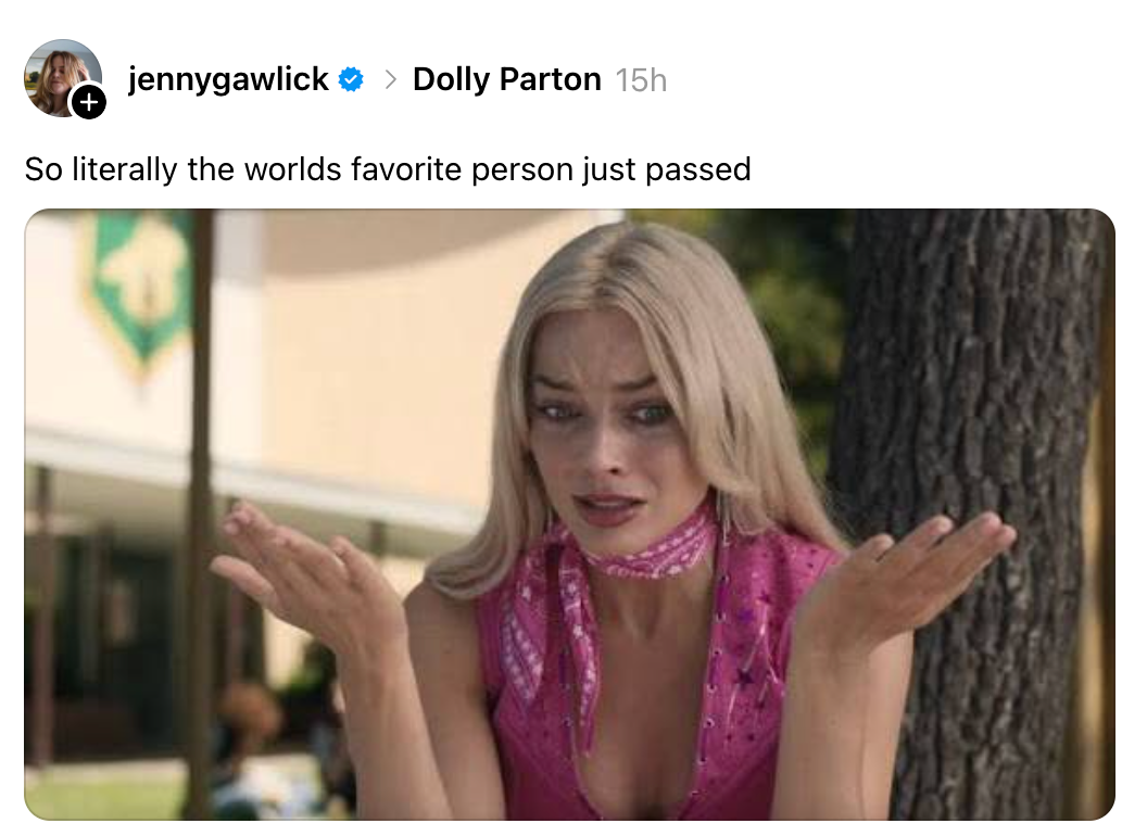 A puzzled woman in a pink outfit gestures with open hands outdoors. Social media post text reads: "So literally the world's favorite person just passed."