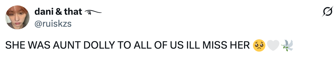 Tweet expressing sadness over the loss of someone referred to as "Aunt Dolly."