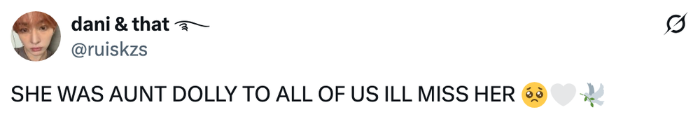 Tweet expressing sadness over the loss of someone referred to as "Aunt Dolly."