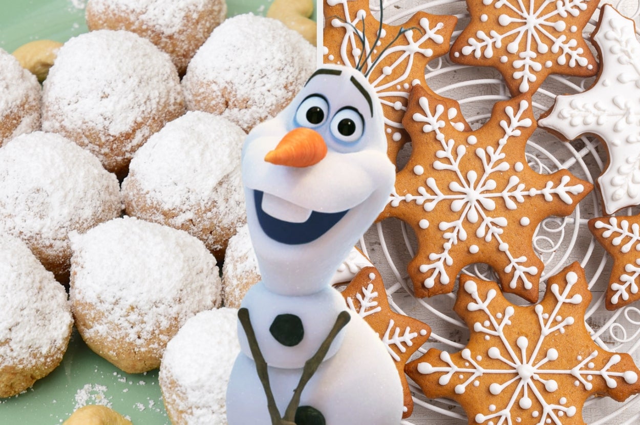 Olaf, a snowman character, stands joyfully in front of snowflake cookies and snowball cookies dusted with powdered sugar